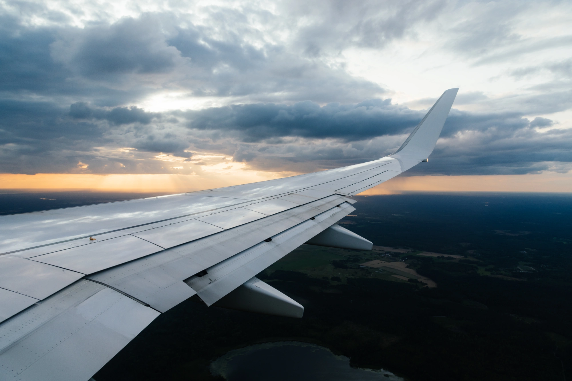 Airplane wing above the clouds